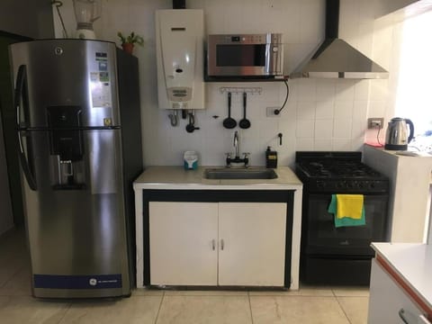 Kitchen or kitchenette, oven