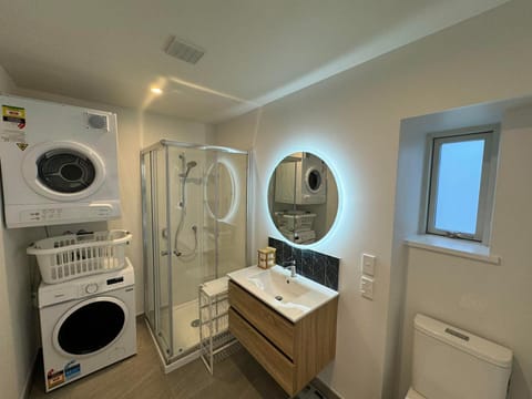 Shower, Bathroom, towels, washing machine, dryer