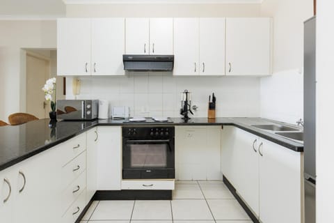 Kitchen or kitchenette, oven, stove