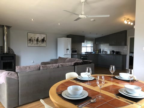 Living room, Dining area, fireplace, kitchen