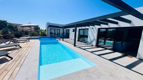 Patio, Pool view, Swimming pool, sunbed