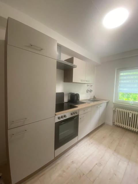 Kitchen or kitchenette, oven, stove