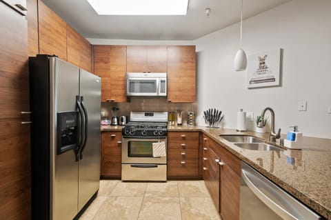 Kitchen or kitchenette, dishwasher, oven, stove, toaster