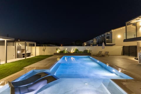 Property building, Night, BBQ facilities, Pool view, Swimming pool, sunbed