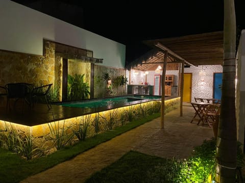 Property building, Patio, Night, Garden, Garden view, Pool view, Swimming pool