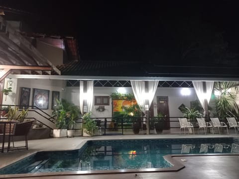 Property building, Patio, Night, Swimming pool