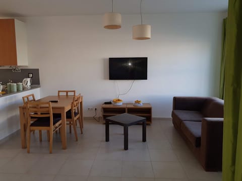 Property building, Living room, Dining area