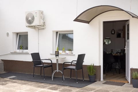 Patio, Balcony/Terrace, Seating area, air conditioner