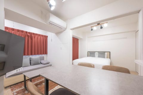 Bed, TV and multimedia, Living room, Photo of the whole room, Seating area, air conditioner