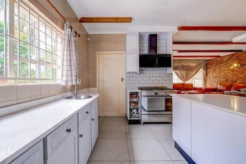 Kitchen or kitchenette, oven, stove