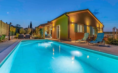 Property building, Patio, Night, Pool view, Swimming pool, sunbed