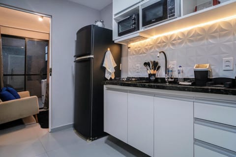 Kitchen or kitchenette, oven, stove