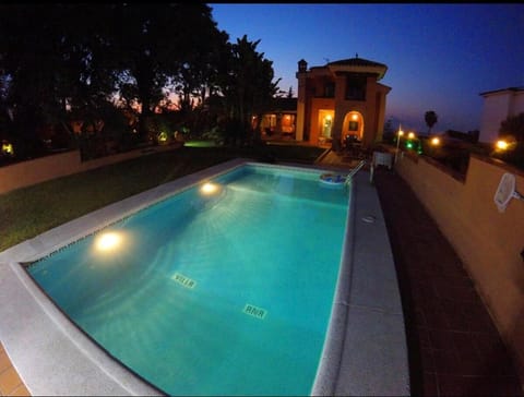 Property building, Night, Pool view, Swimming pool