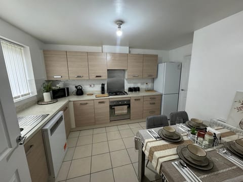 Kitchen or kitchenette, Dining area, dishwasher, oven, stove, toaster