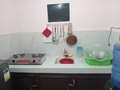 Kitchen or kitchenette, stove