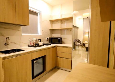 Coffee/tea facilities, Kitchen or kitchenette, dishwasher, minibar, oven