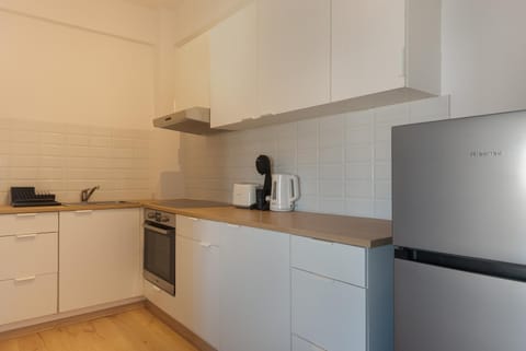 Kitchen or kitchenette, oven, stove