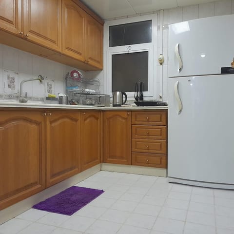 Kitchen or kitchenette, oven, stove, toaster