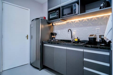 Kitchen or kitchenette, oven, stove