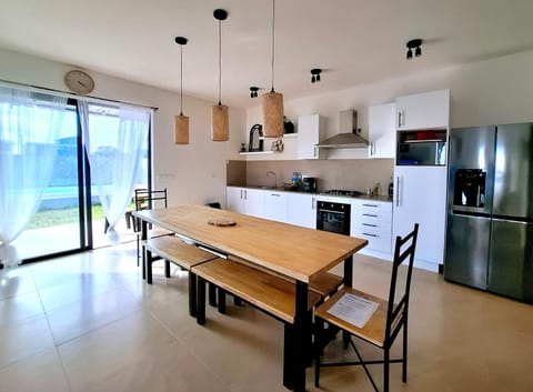 Kitchen or kitchenette, Dining area, Pool view