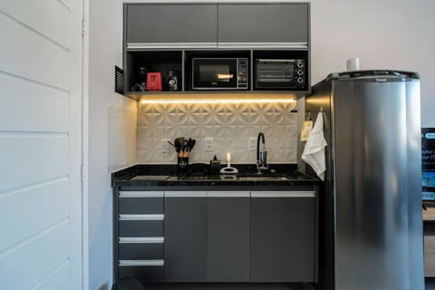 Kitchen or kitchenette, oven, stove