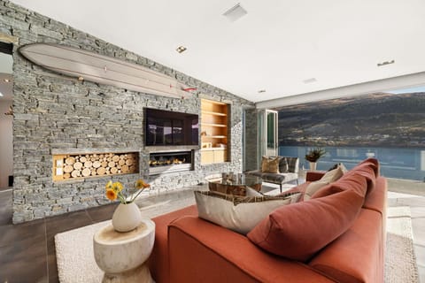 Natural landscape, TV and multimedia, Living room, Seating area, Lake view, Mountain view