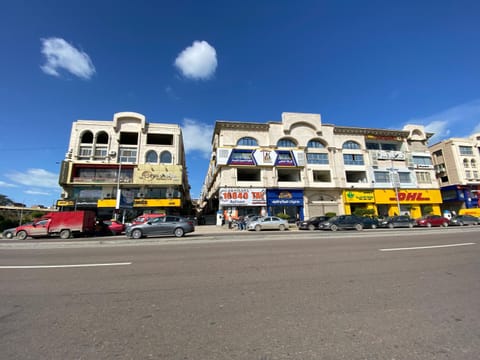 Property building, Day, Neighbourhood, City view, Street view, Location, Parking