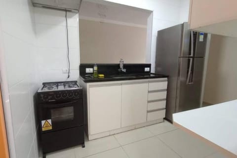 Kitchen or kitchenette, minibar, oven, stove