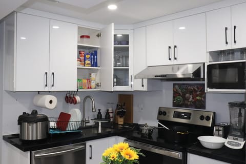 Kitchen or kitchenette, dishwasher, oven, stove, toaster