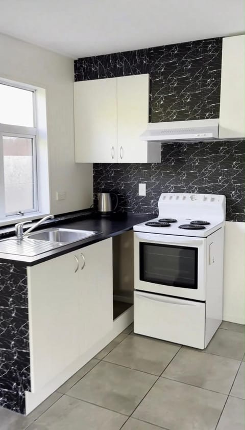 Kitchen or kitchenette, oven, stove