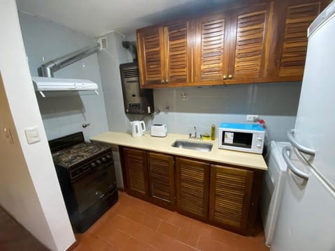 Kitchen or kitchenette, oven, toaster