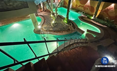 Property building, Night, Pool view, Swimming pool