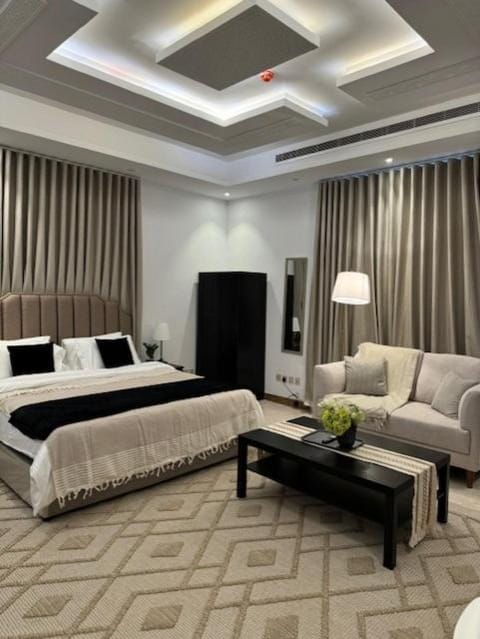 Bed, Living room, Seating area, Bedroom