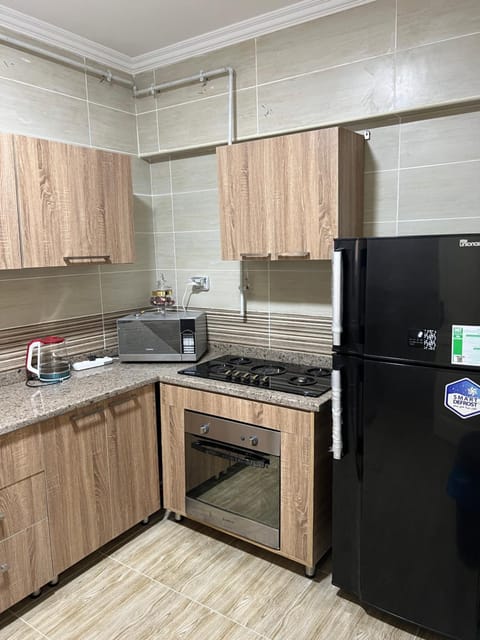 Kitchen or kitchenette, oven, stove