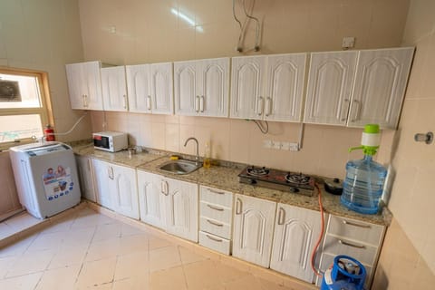 Kitchen or kitchenette, oven, stove