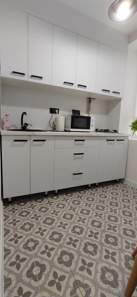 Kitchen or kitchenette, stove