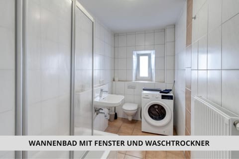 Toilet, Bathroom, towels, washing machine, dryer