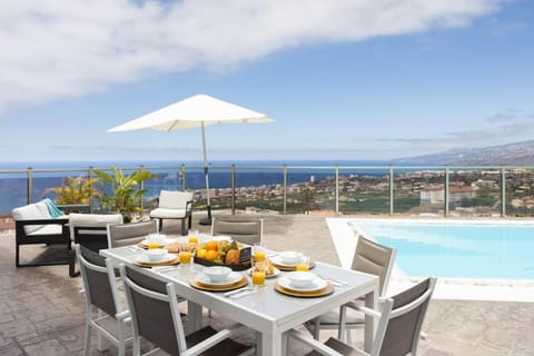 View (from property/room), Mountain view, Pool view, Sea view, Swimming pool