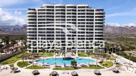 Property building, Day, Pool view, Swimming pool, sunbed