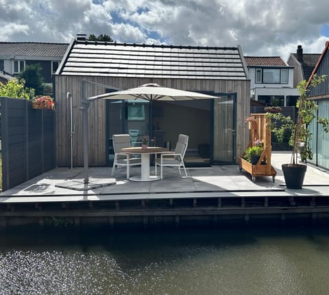 Property building, Day, Natural landscape, Fishing, View (from property/room), Balcony/Terrace, Dining area, Animals, River view