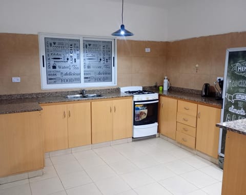 Kitchen or kitchenette, oven, stove