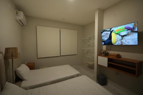 Communal lounge/ TV room, Bed, Bedroom, air conditioner