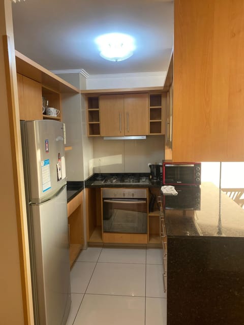 Kitchen or kitchenette, oven, stove