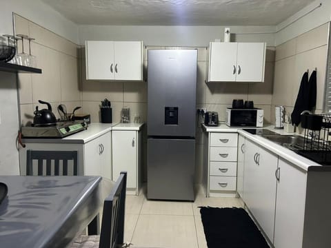 Kitchen or kitchenette, stove, toaster