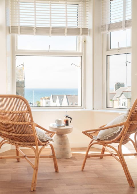 View (from property/room), Living room, Seating area, Sea view