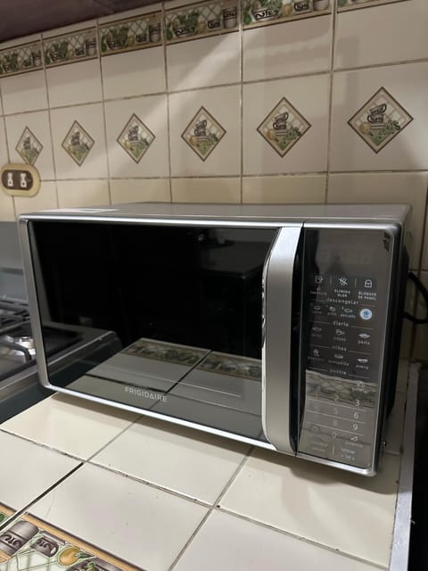 Kitchen or kitchenette, microwave