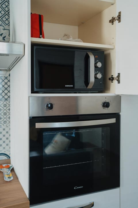 Kitchen or kitchenette, microwave, oven