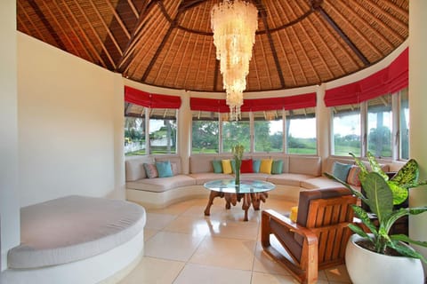 Living room, Seating area, Garden view, Pool view