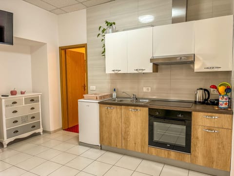 Kitchen or kitchenette, oven, stove