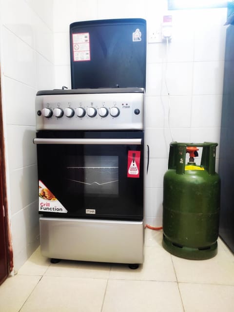 Kitchen or kitchenette, oven